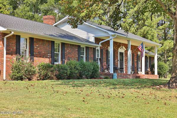 10.7 Acres of Land with Home for Sale in Martin, Tennessee