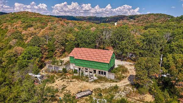 15.4 Acres of Land with Home for Sale in Branson, Missouri