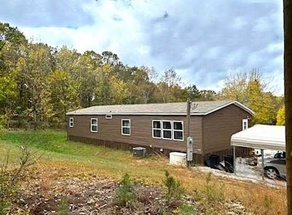 3.48 Acres of Land with Home for Sale in Mountain View, Arkansas