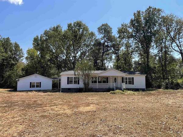 4.4 Acres of Land with Home for Auction in Camden, Arkansas