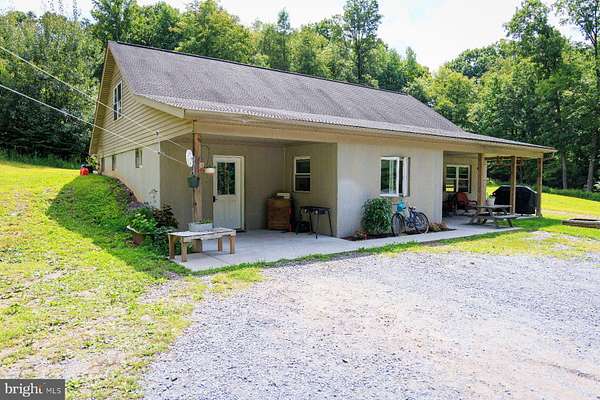 7.66 Acres of Land with Home for Auction in Spring Glen, Pennsylvania