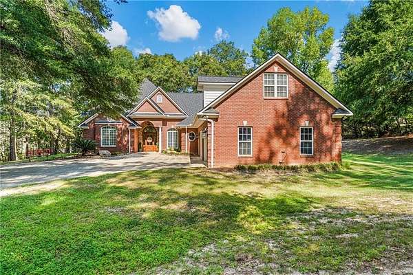 9.15 Acres of Land with Home for Sale in Seale, Alabama