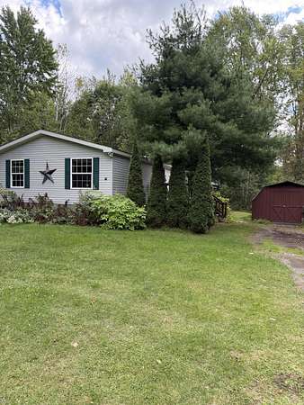 1.69 Acres of Land with Home for Sale in Plattsburgh, New York