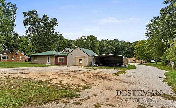 3.75 Acres of Land with Home for Sale in Twin Lake, Michigan