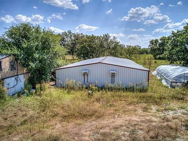 40 Acres of Agricultural Land with Home for Sale in Okemah, Oklahoma