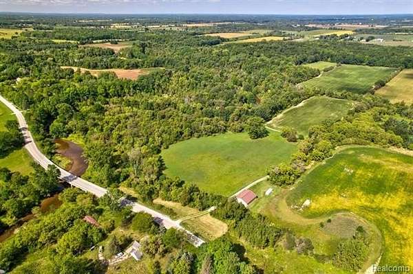 63.8 Acres of Land for Sale in Brockway Township, Michigan