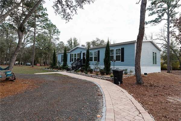 2.5 Acres of Land with Home for Sale in Bronson, Florida