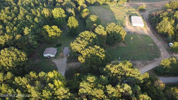 9.5 Acres of Land with Home for Sale in Holly Springs, Mississippi