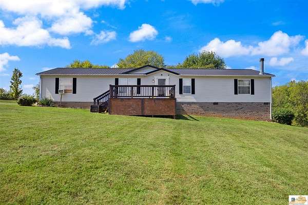 5 Acres of Land with Home for Sale in Park City, Kentucky