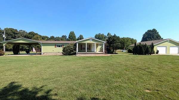 5.1 Acres of Land with Home for Sale in Paris, Tennessee