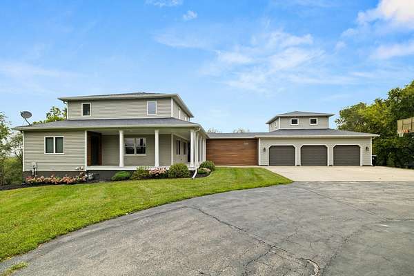 12.8 Acres of Land with Home for Sale in Colfax, Iowa