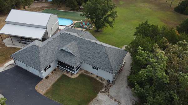 10 Acres of Land with Home for Sale in Walnut Shade, Missouri
