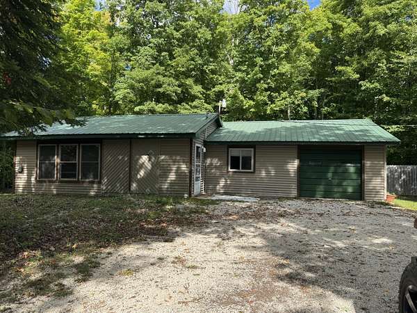 12.5 Acres of Land with Home for Sale in Gould City, Michigan