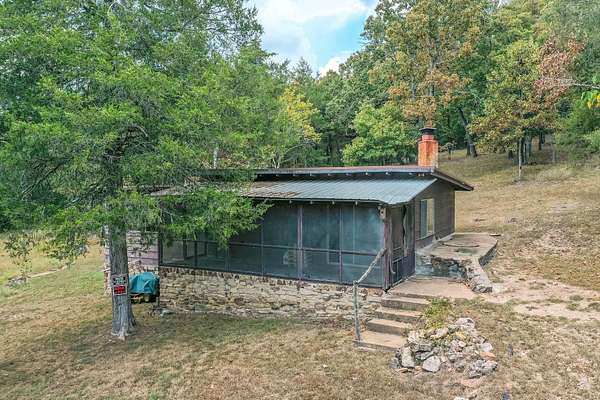 1.6 Acres of Land with Home for Sale in Cedarcreek, Missouri