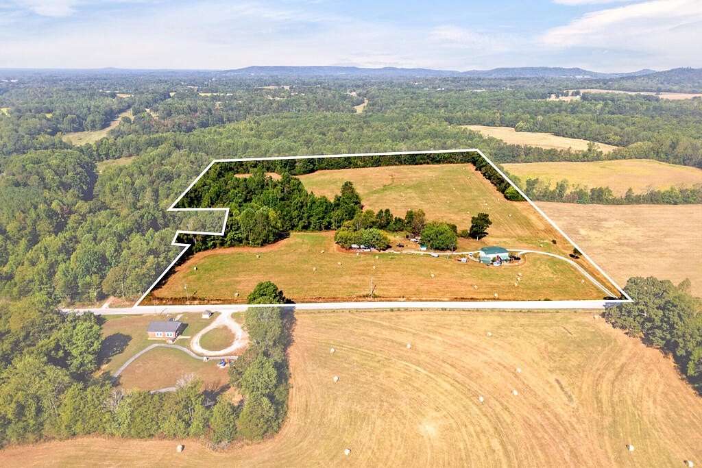 23 Acres of Agricultural Land with Home for Sale in Doyle, Tennessee