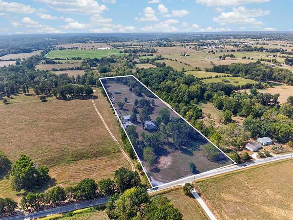 10 Acres of Land with Home for Sale in Sparta, Missouri