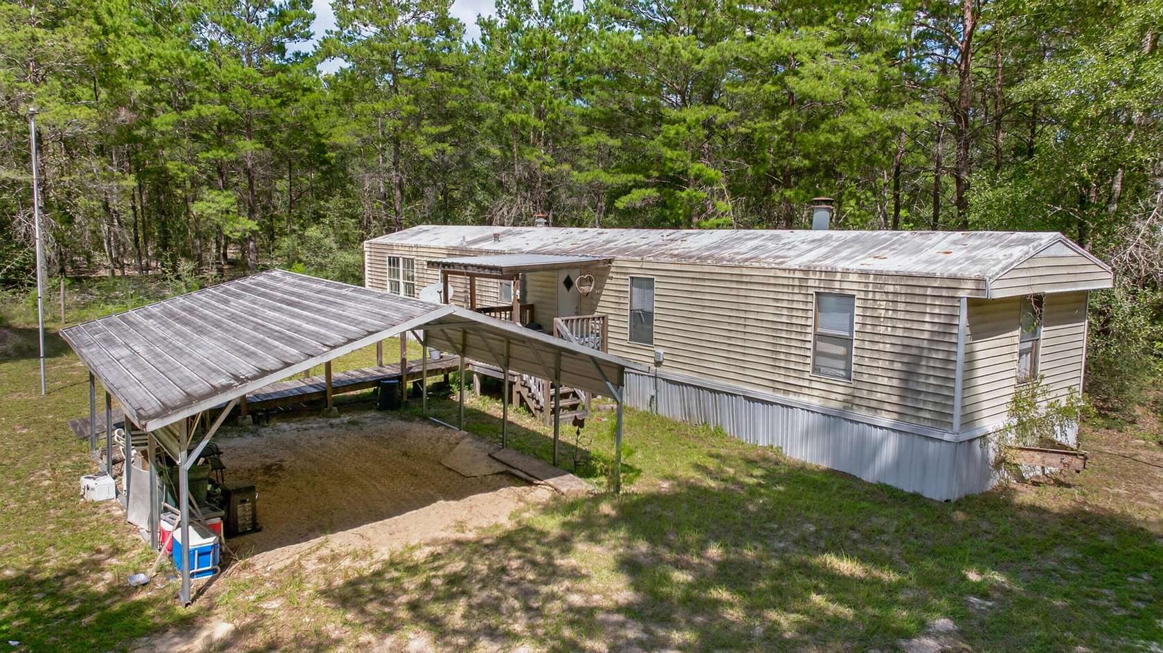 10 Acres of Recreational Land with Home for Sale in Crestview, Florida