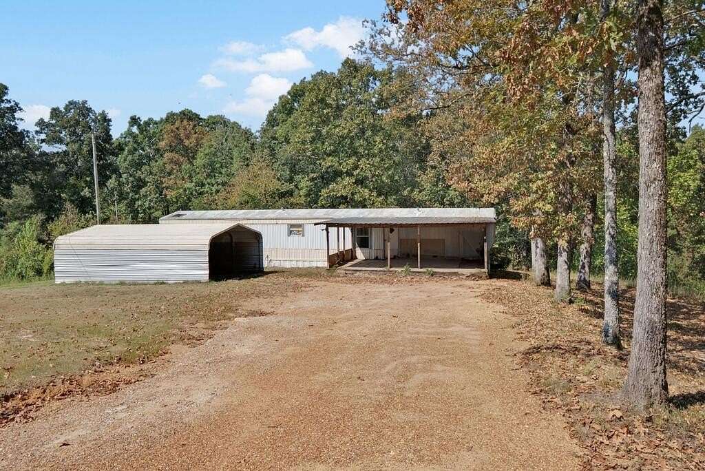 1.8 Acres of Land with Home for Sale in Batesville, Mississippi