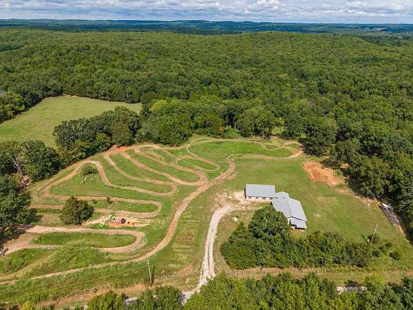 99 Acres of Land with Home for Auction in Irondale, Missouri