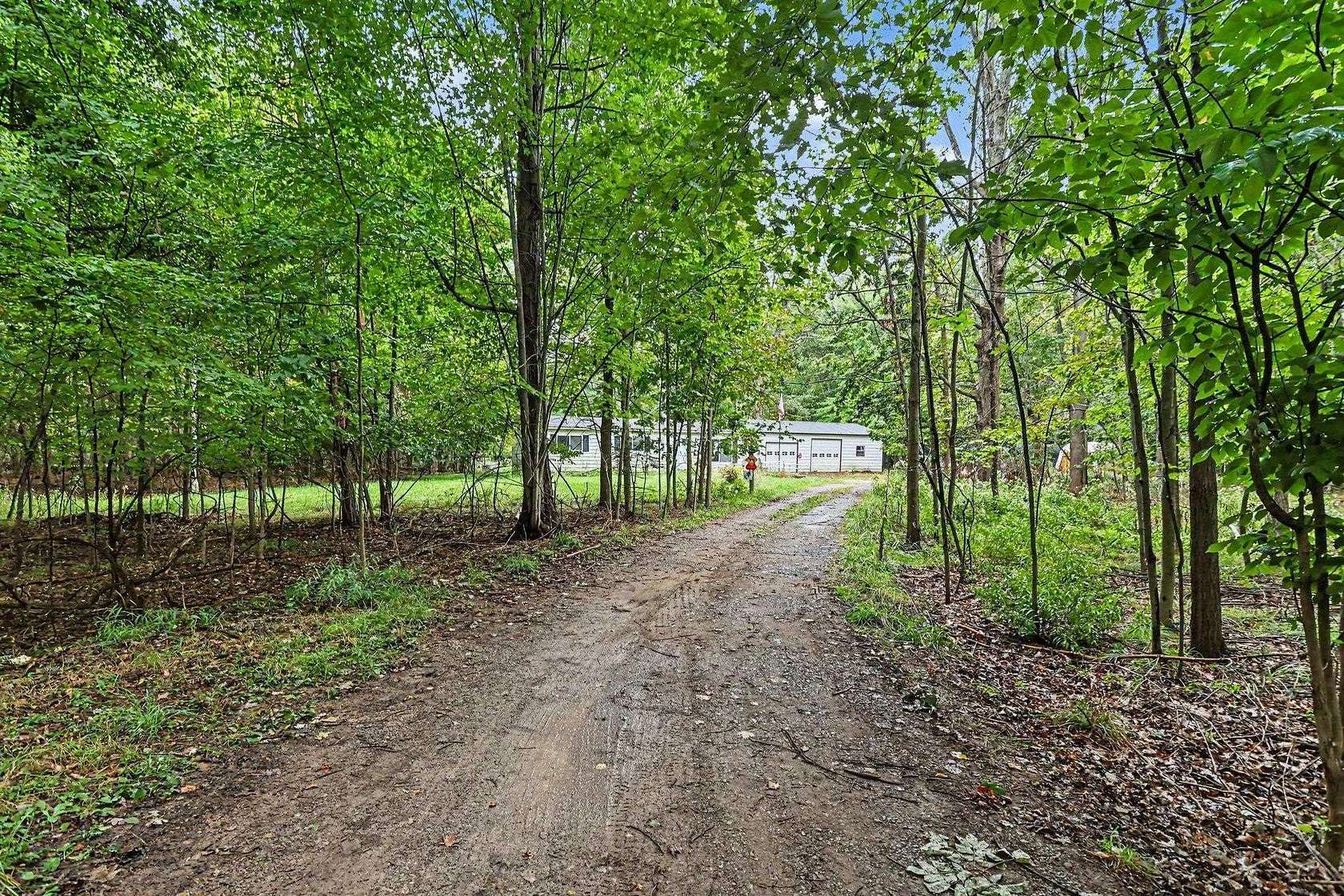 16.4 Acres of Recreational Land with Home for Sale in St. Charles, Michigan