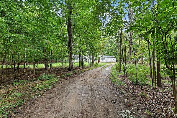 16.4 Acres of Recreational Land with Home for Sale in St. Charles, Michigan