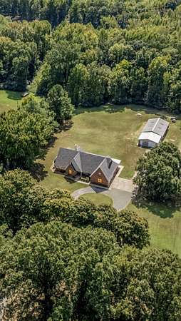 5.44 Acres of Land with Home for Sale in Lakeland, Tennessee