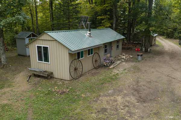 33 Acres of Recreational Land with Home for Sale in Trenary, Michigan