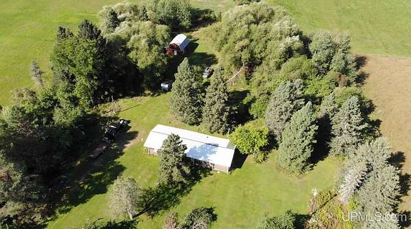 4 Acres of Land with Home for Sale in Pelkie, Michigan