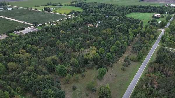 21 Acres of Recreational Land with Home for Sale in Ravenna, Michigan