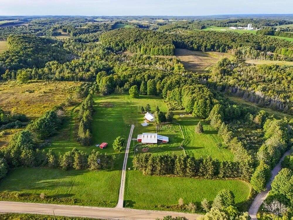 40 Acres of Land with Home for Sale in Ellsworth, Michigan