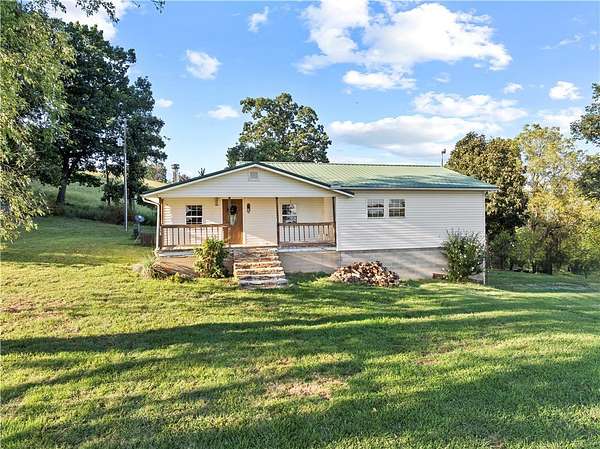 45.2 Acres of Land with Home for Sale in Marble Falls Township, Arkansas