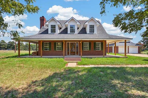 2.78 Acres of Land with Home for Sale in Elkhart, Texas