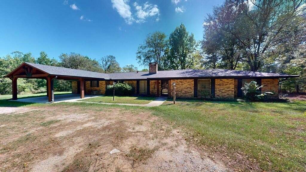 6.9 Acres of Land with Home for Sale in Jasper, Texas