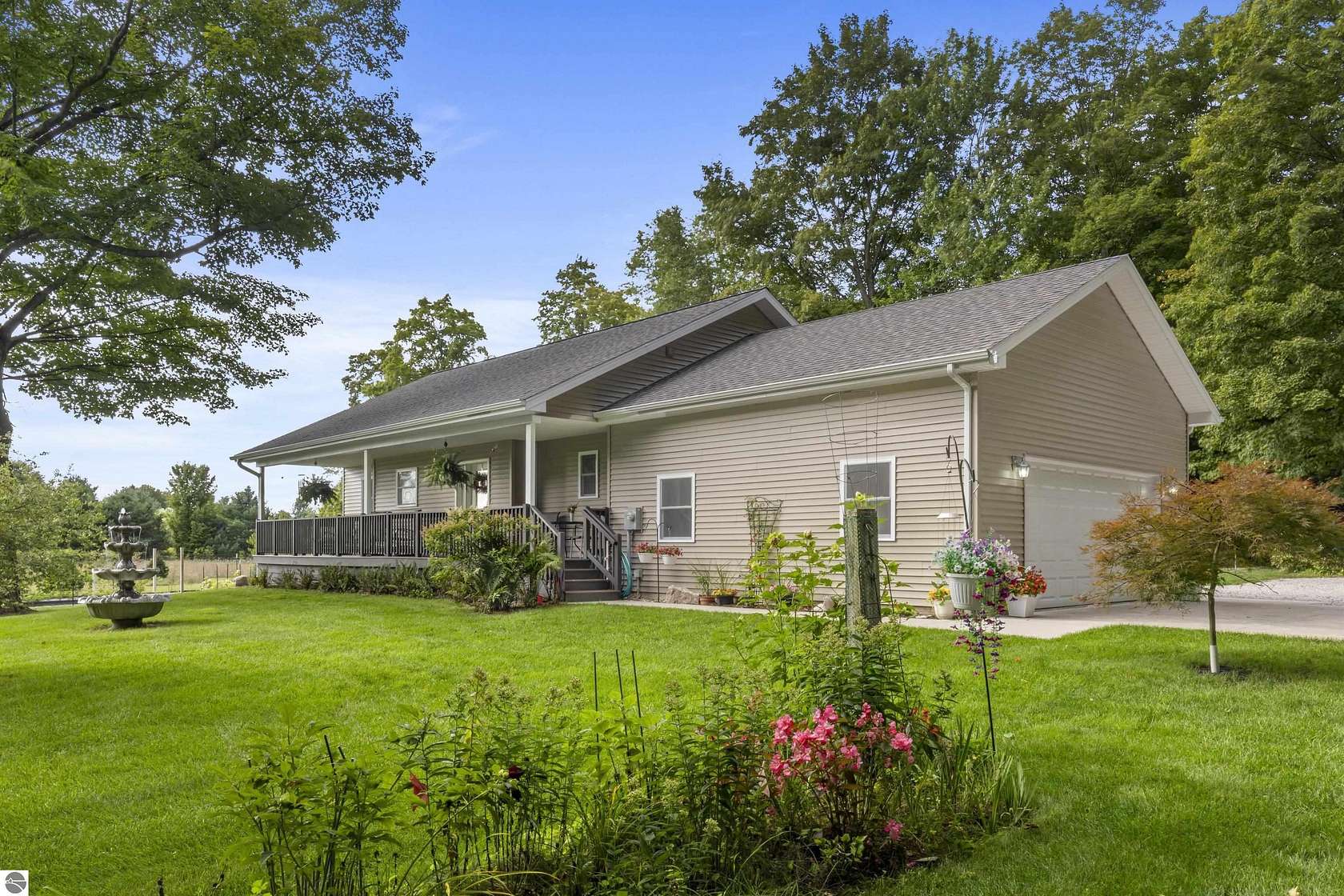 10 Acres of Recreational Land with Home for Sale in Honor, Michigan