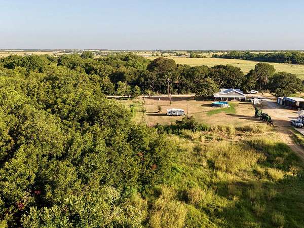 5.24 Acres of Land with Home for Sale in Grandview, Texas