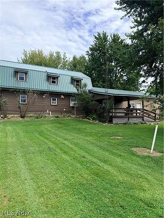 5.12 Acres of Land with Home for Sale in Rome, Ohio