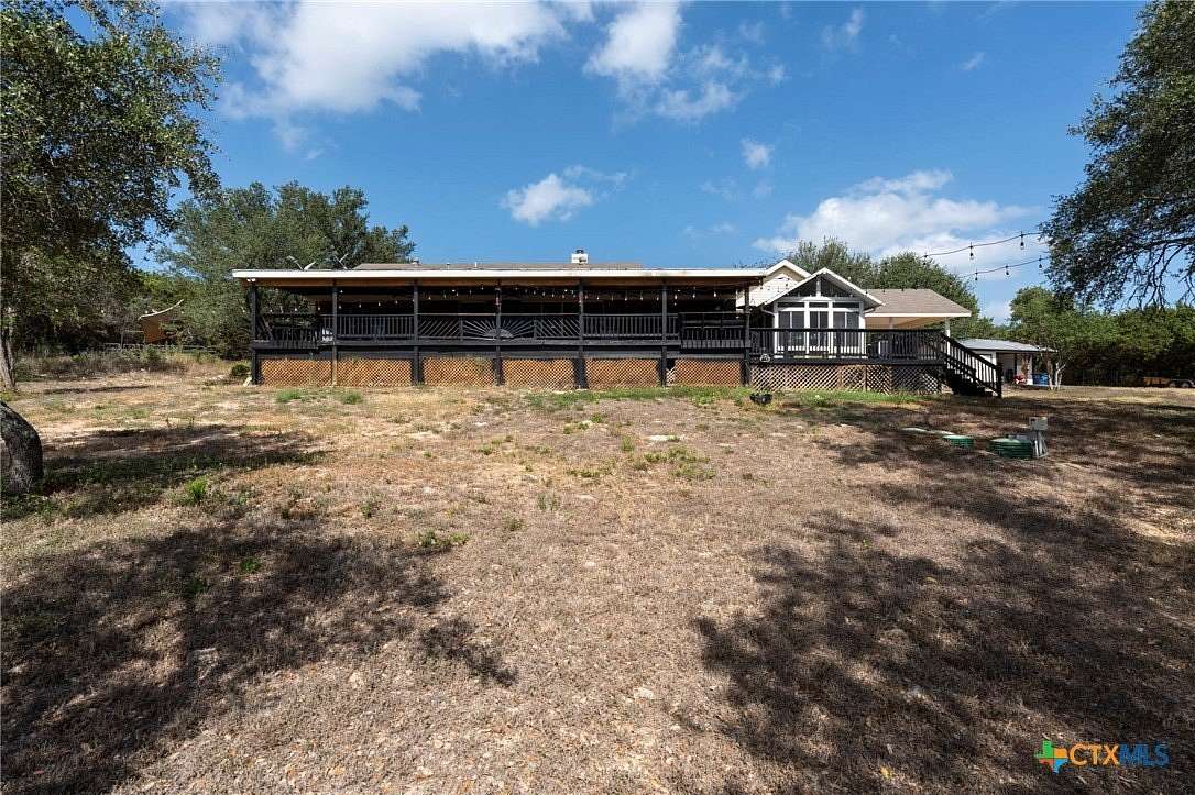 8 Acres of Land with Home for Sale in Canyon Lake, Texas