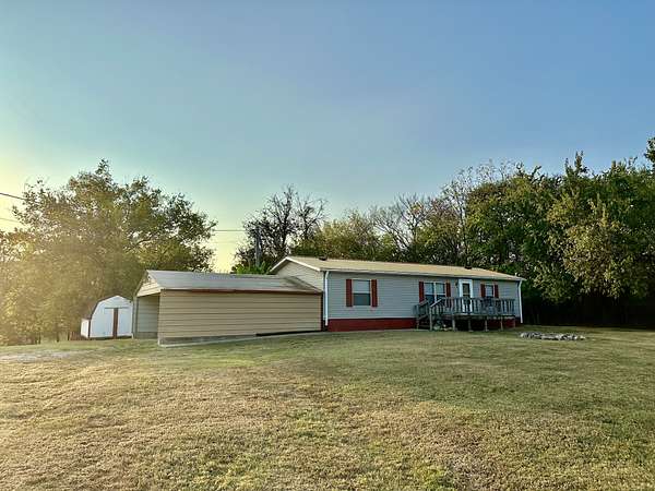 2.14 Acres of Land with Home for Sale in Brush Creek, Tennessee