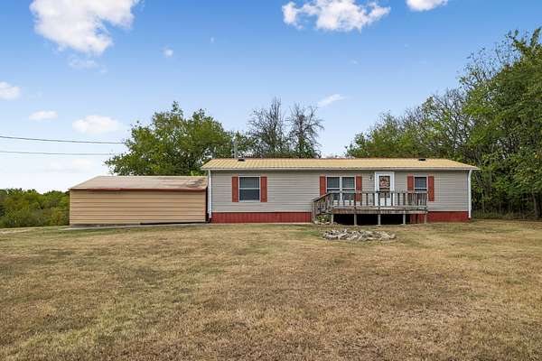 2.14 Acres of Land with Home for Sale in Brush Creek, Tennessee