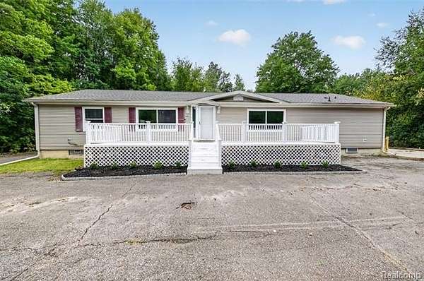 18.6 Acres of Land with Home for Sale in Romulus, Michigan