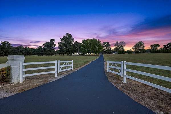 10.4 Acres of Land with Home for Sale in Normandy, Tennessee