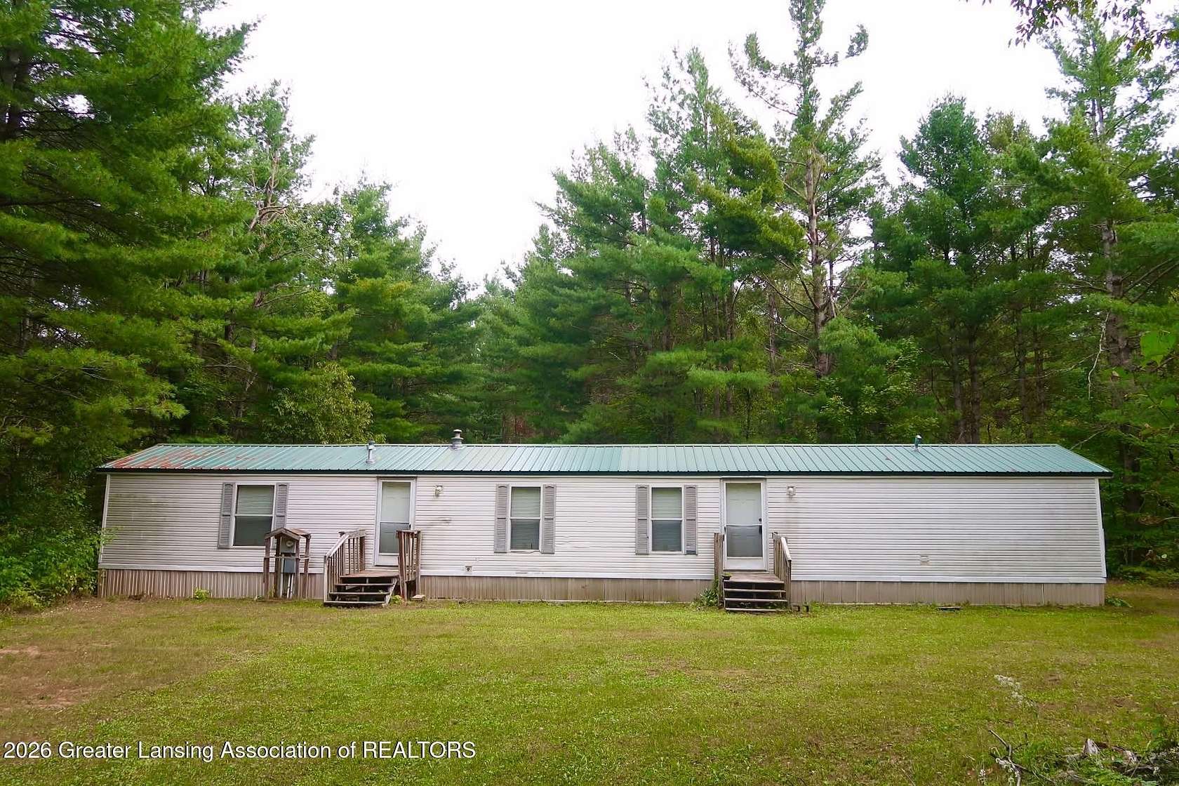 10 Acres of Land with Home for Sale in Elmira, Michigan
