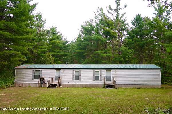 10 Acres of Land with Home for Sale in Elmira, Michigan