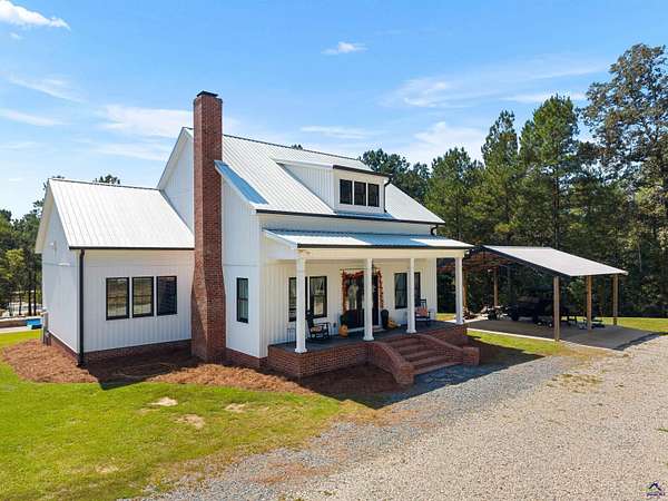 12.4 Acres of Land with Home for Sale in Reynolds, Georgia