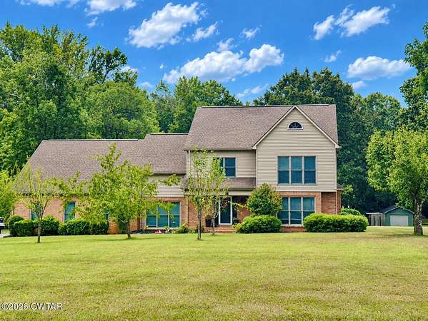 11.8 Acres of Land with Home for Sale in Henderson, Tennessee