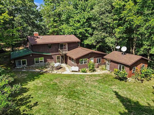 10.3 Acres of Land with Home for Sale in Howard City, Michigan