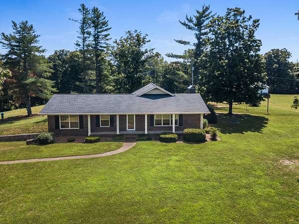 13.4 Acres of Land with Home for Auction in Greenbrier, Tennessee