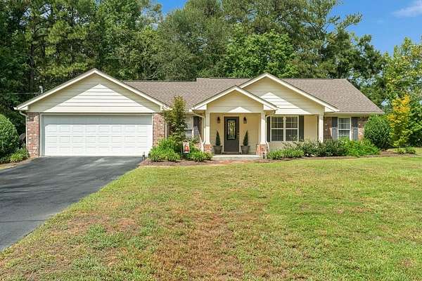 6.9 Acres of Land with Home for Sale in Laurel, Mississippi