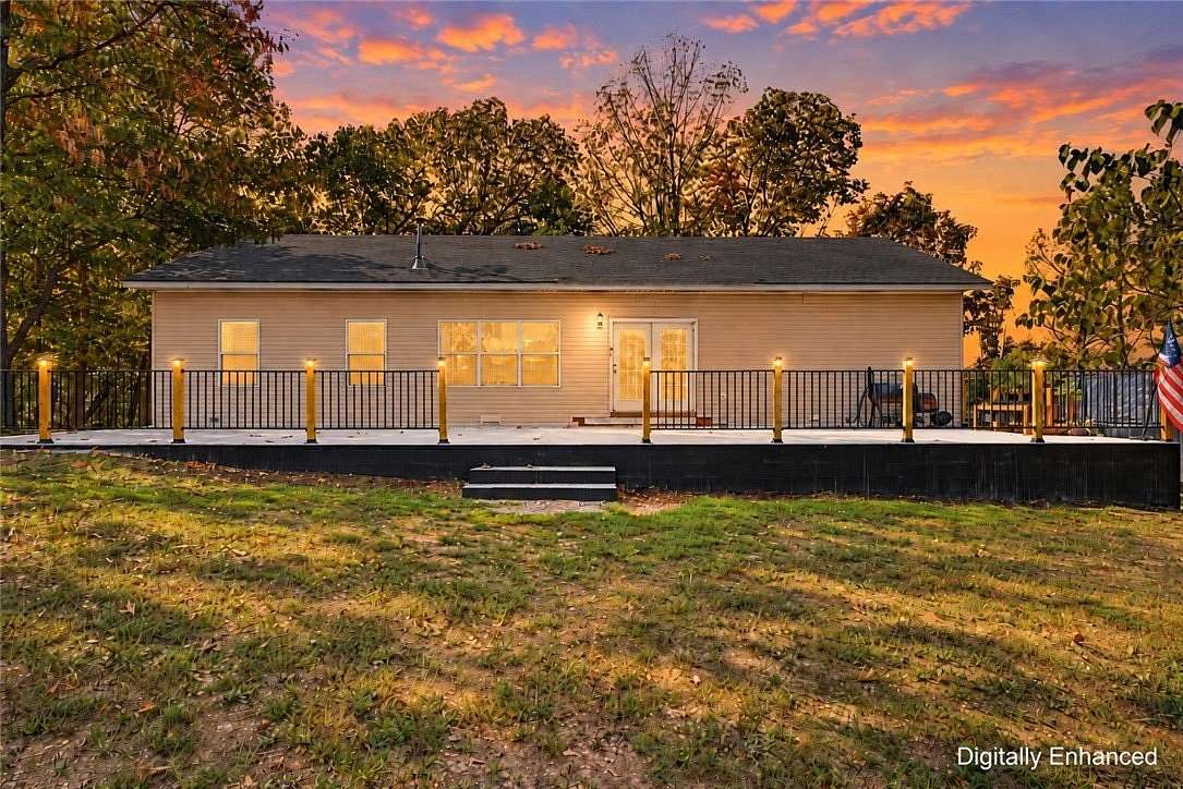 2 Acres of Land with Home for Sale in Gravette, Arkansas