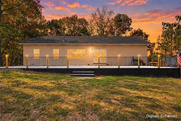 2 Acres of Land with Home for Sale in Gravette, Arkansas